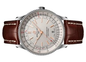 The brown leather straps copy watches have silvery dials.