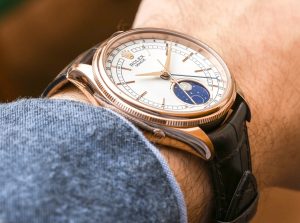 The white dials fake watches have brown leather straps.
