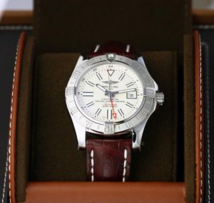 The stainless steel copy watches have brown leather straps.